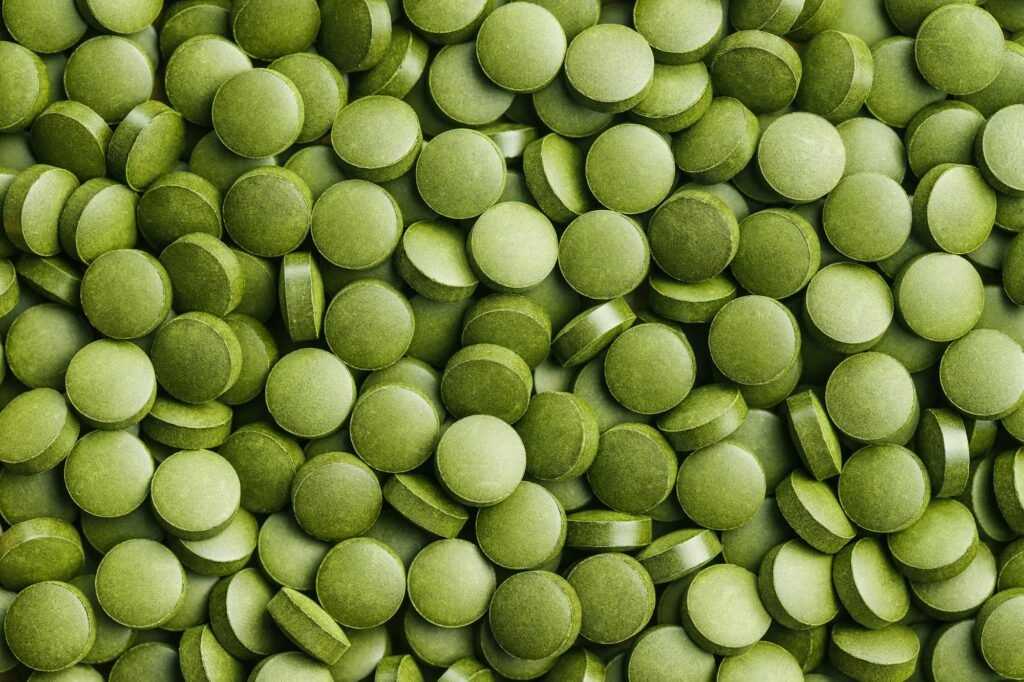 Green chlorella pills or green barley pills.