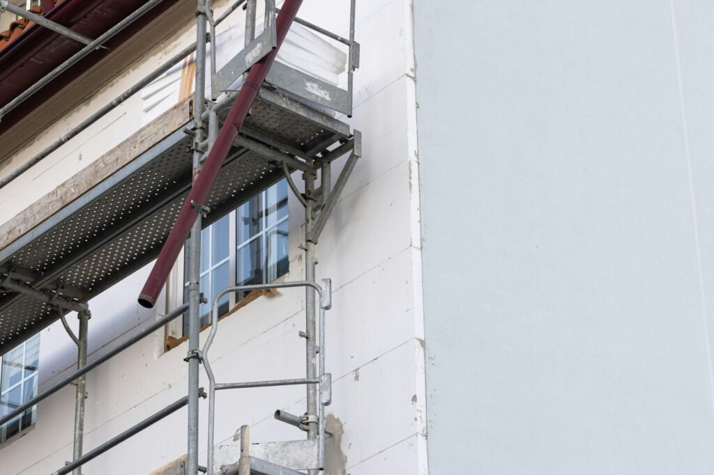 Renovation of the facade of an old building with External thermal insulation cladding